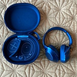 Sony MDR-1000x noise cancelling headphones over the ear